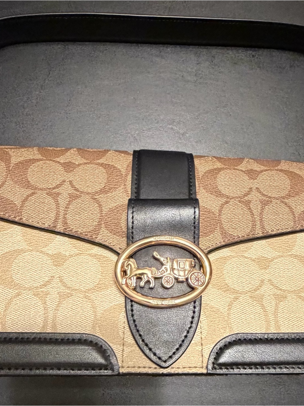 Coach Tan Signature Canvas Clutch with Black Leather Trim and Gold Hardware